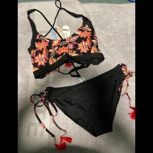 Bingo surf women’s bikini with tassels detail.